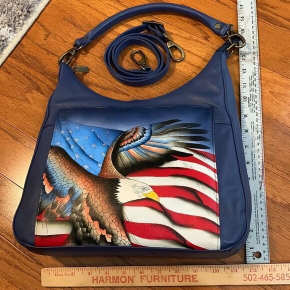 Anuschka crossbody w/adjustable strap and small handle to change to shoulder bag - Picture 12 of 12